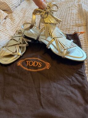 Tod’s Gold leather Women's Fringe Gladiator Sandals SKU: F3188